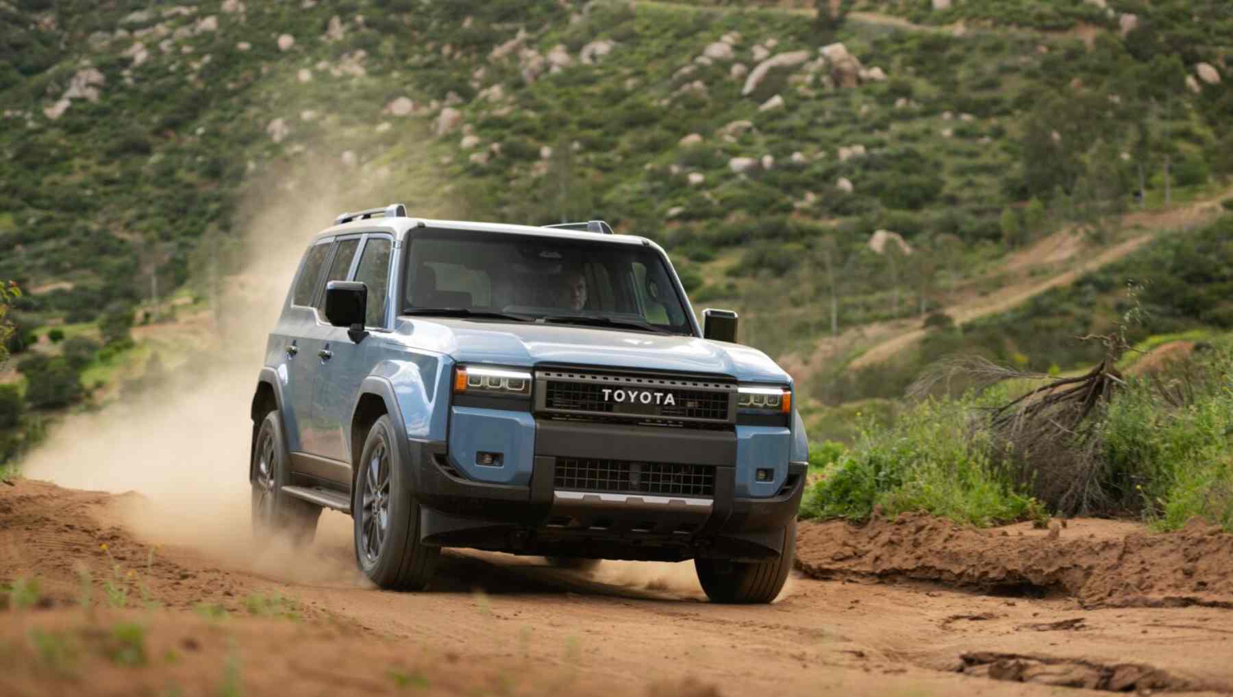 A blue Toyota LandCruiser going offroad