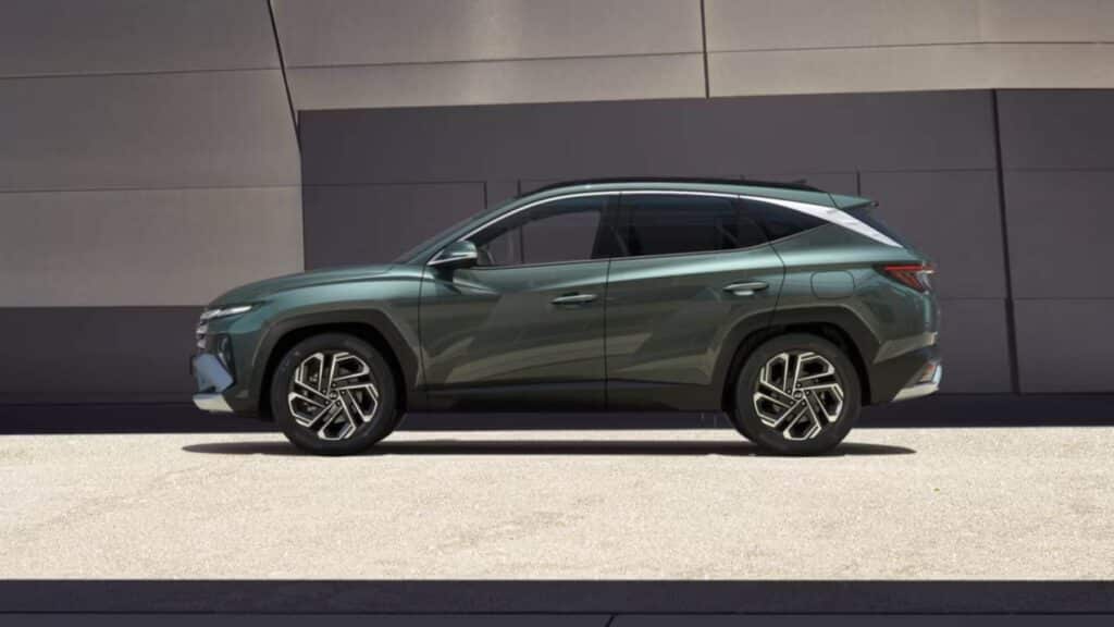 A side view of a green 2025 Hyundai Tucson