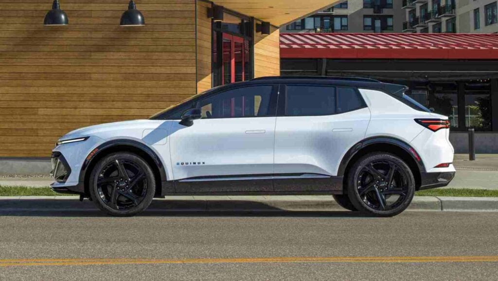 A side view of a white Chevy Equinox