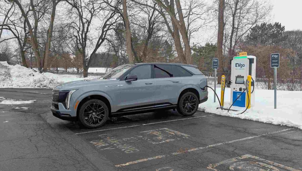 Side view of a Cadillac Escalade IQ charging