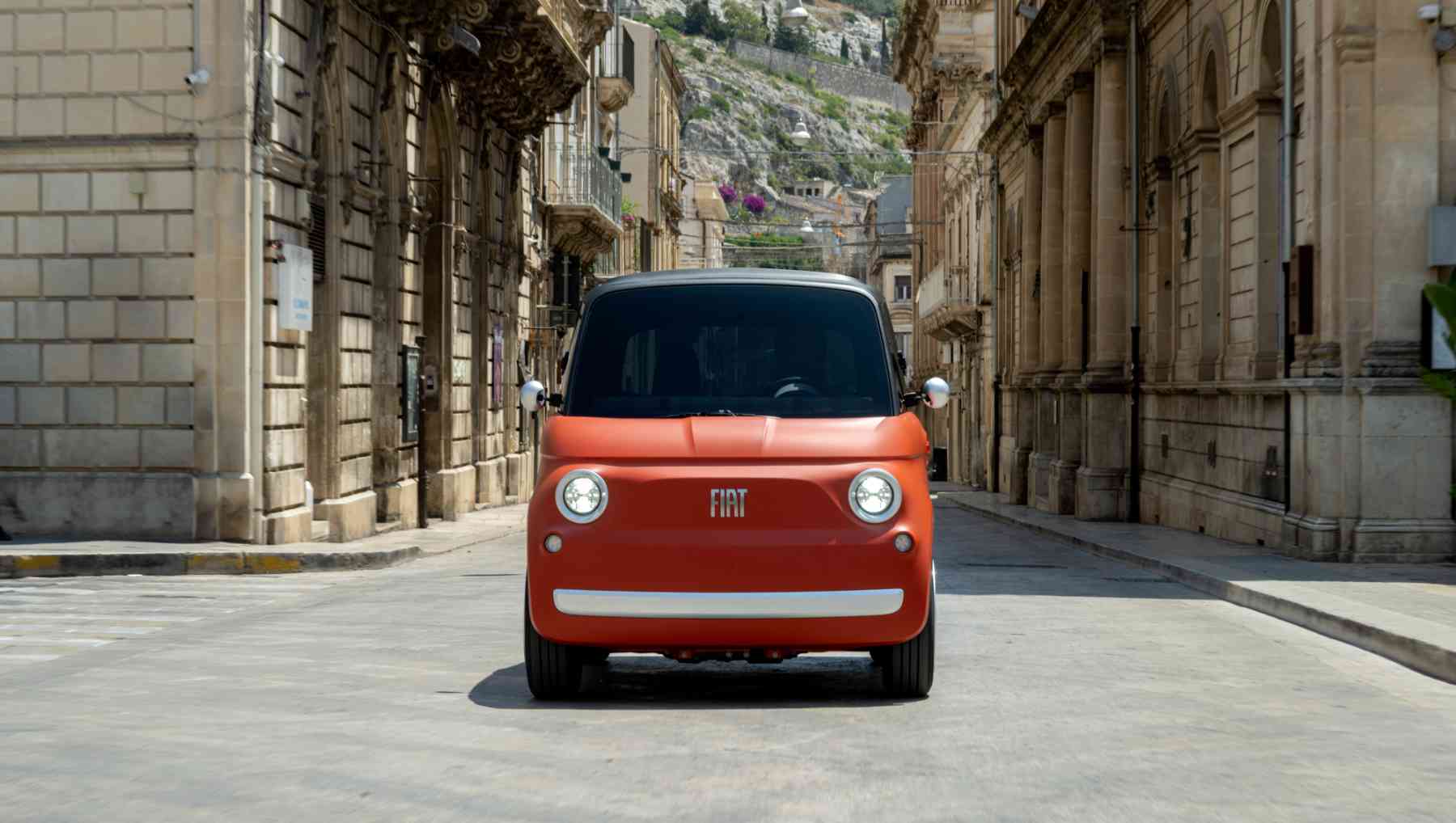 Front view of a red Fiat Topolino