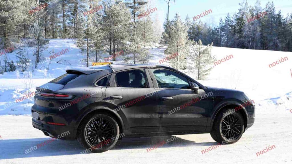 Spy photo of a 2027 Porsche Cayenne Coupe Turbo GT winter testing in the snow