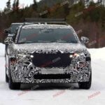 Spy shot of the 2027 Range Rover Velar Front covered in camouflage.