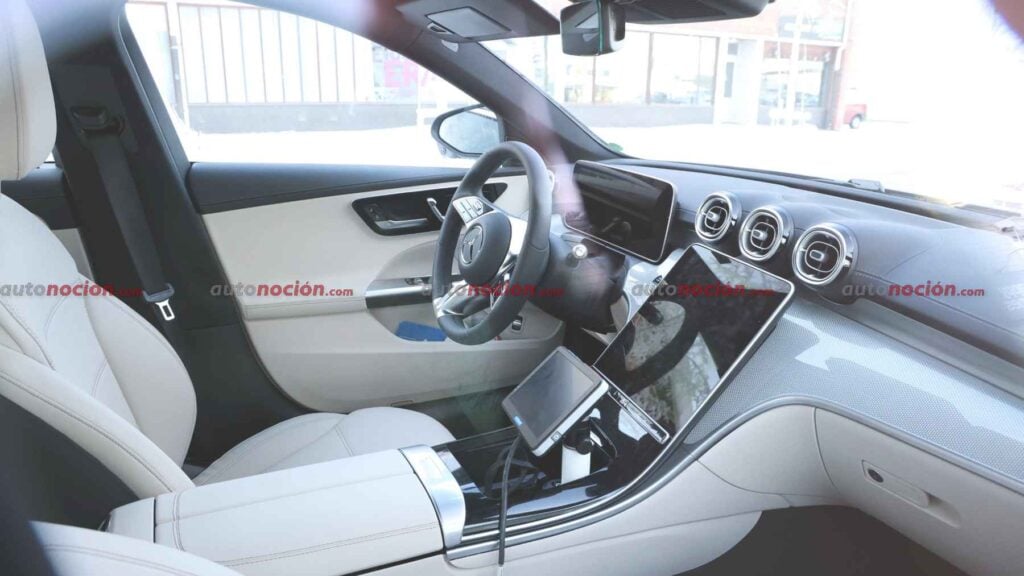 Spy shots of a 2027 Mercedes-Benz C-Class interior and steering wheel