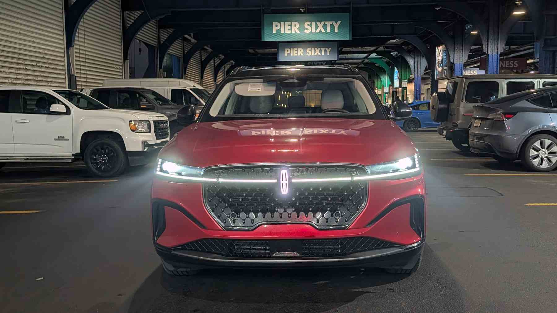 Front view of a red 2026 Lincoln Nautilus in a parking lot