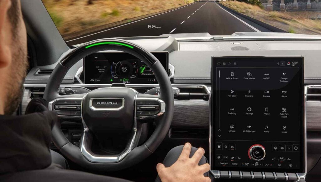 A man driving along with GM's Super Cruise enabled