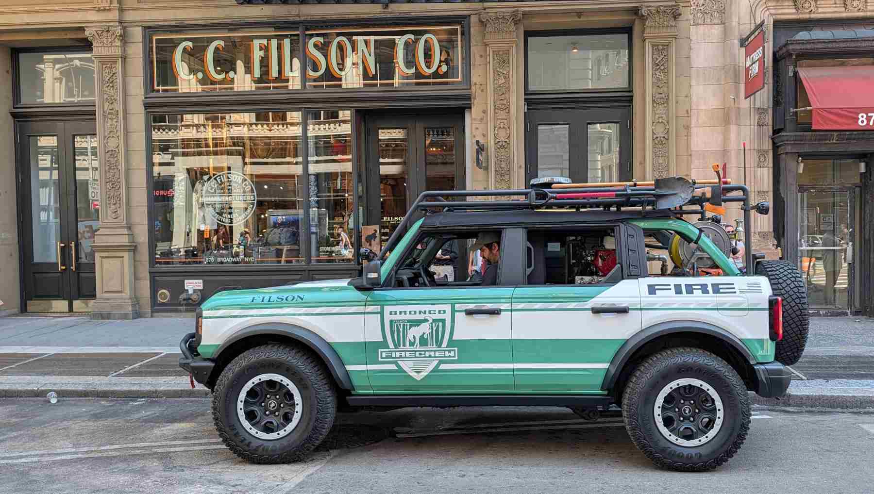 The Ford Bronco x Filson Wildland Fire Rig concept parked in front of Filson's NYC store