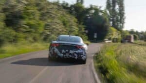 A blurry photo of a prototype Maserati GranTurismo