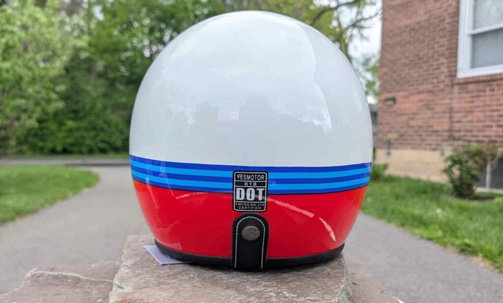 the back of a helmet with a DOT certified sticker
