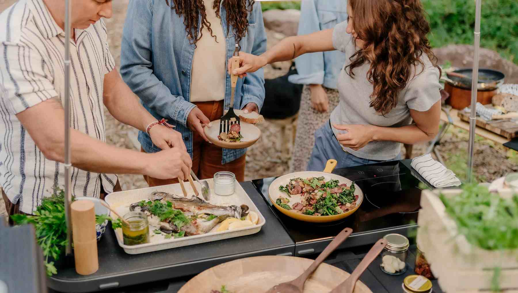 Rivian's travel kitchen accessory in use
