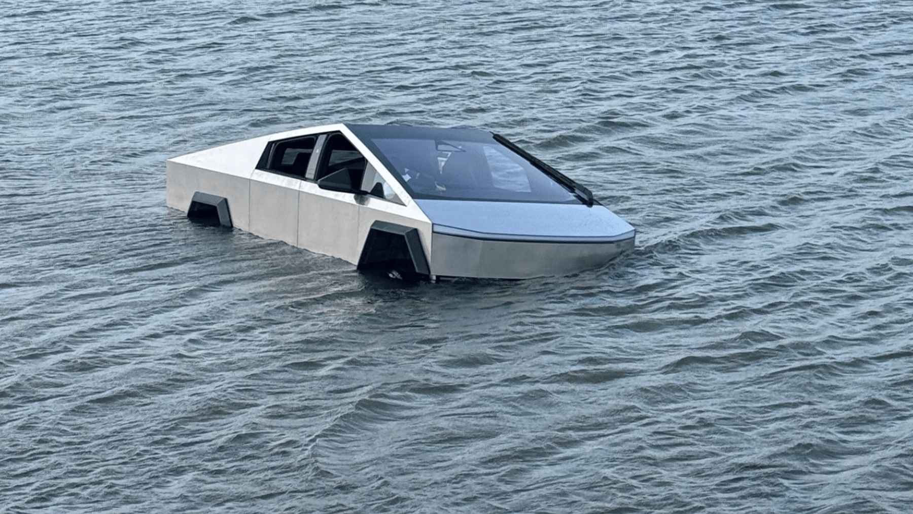 A Texas Man Just Drove His Tesla Cybertruck Into a Lake to Test Its ‘Wade Mode’ Feature. The Truck Shut Down and Began Filling With Water. Tesla’s Warranty Does Not Cover Water Damage