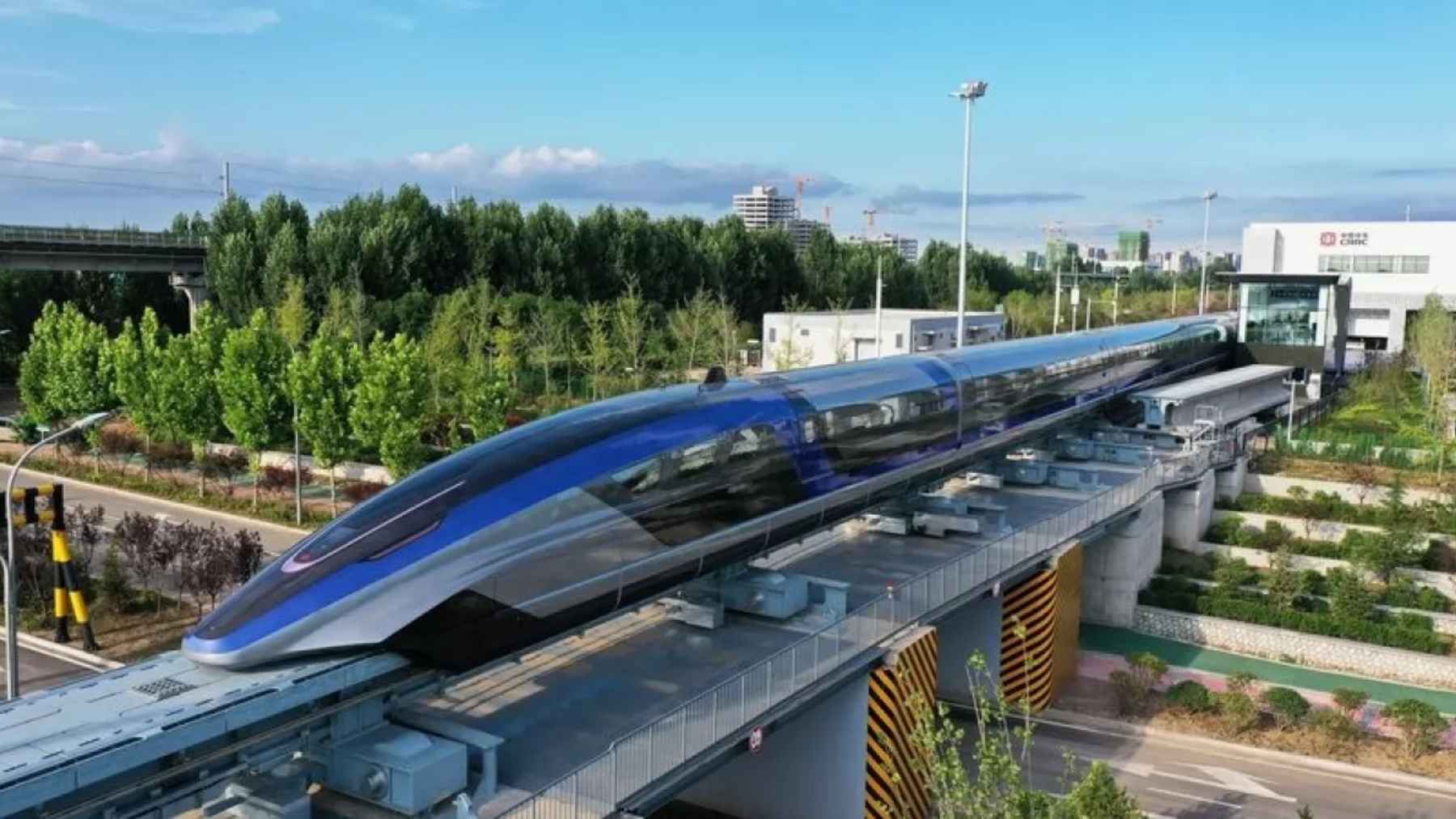 China just flung a levitating train through a 2-kilometer tube with most of the air sucked out at 387 miles an hour, down a pipe flattened to within a third of a millimeter, chasing a speed that would beat a passenger jet