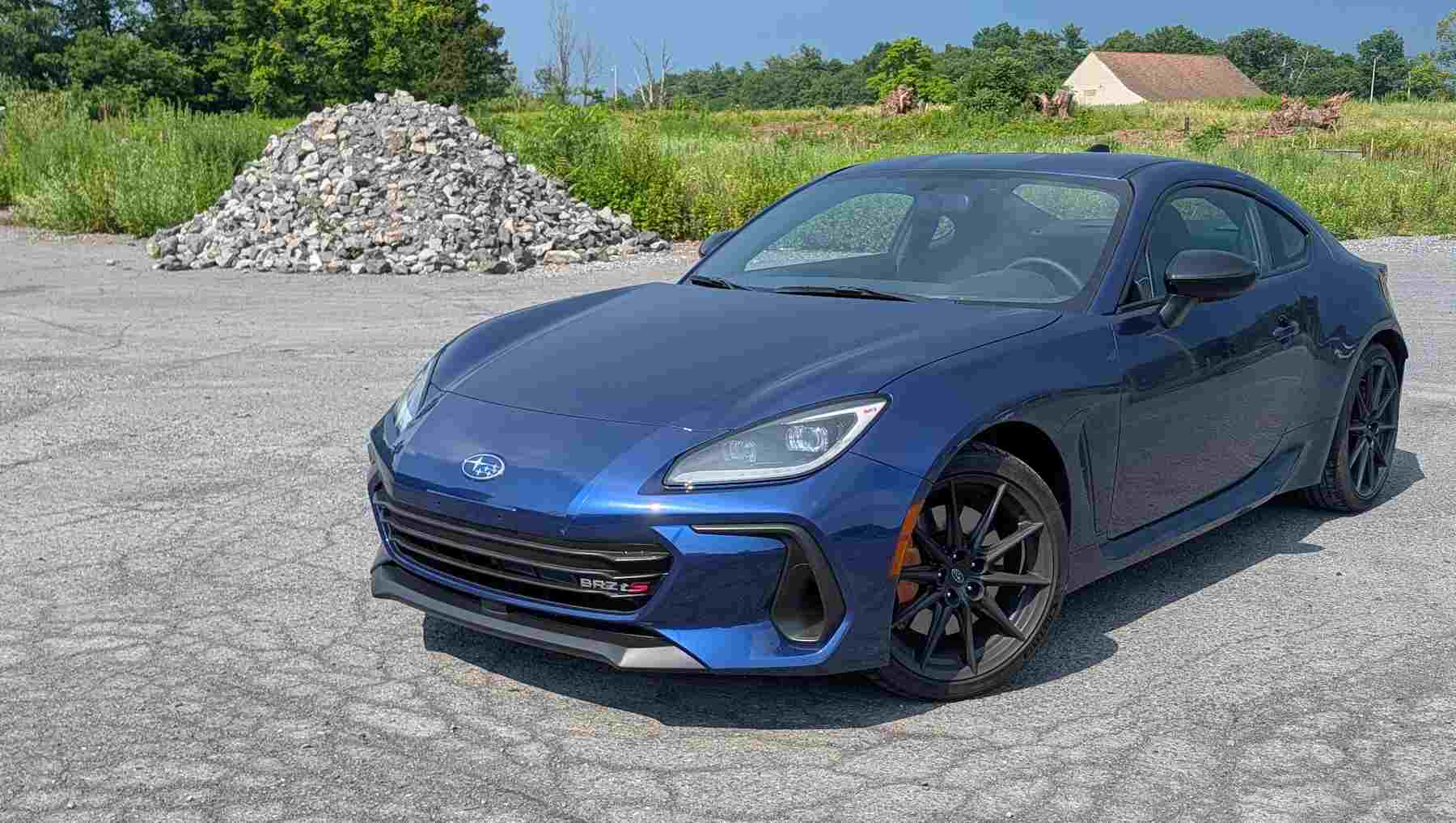 Front 3/4 view of a blue Subaru BRZ