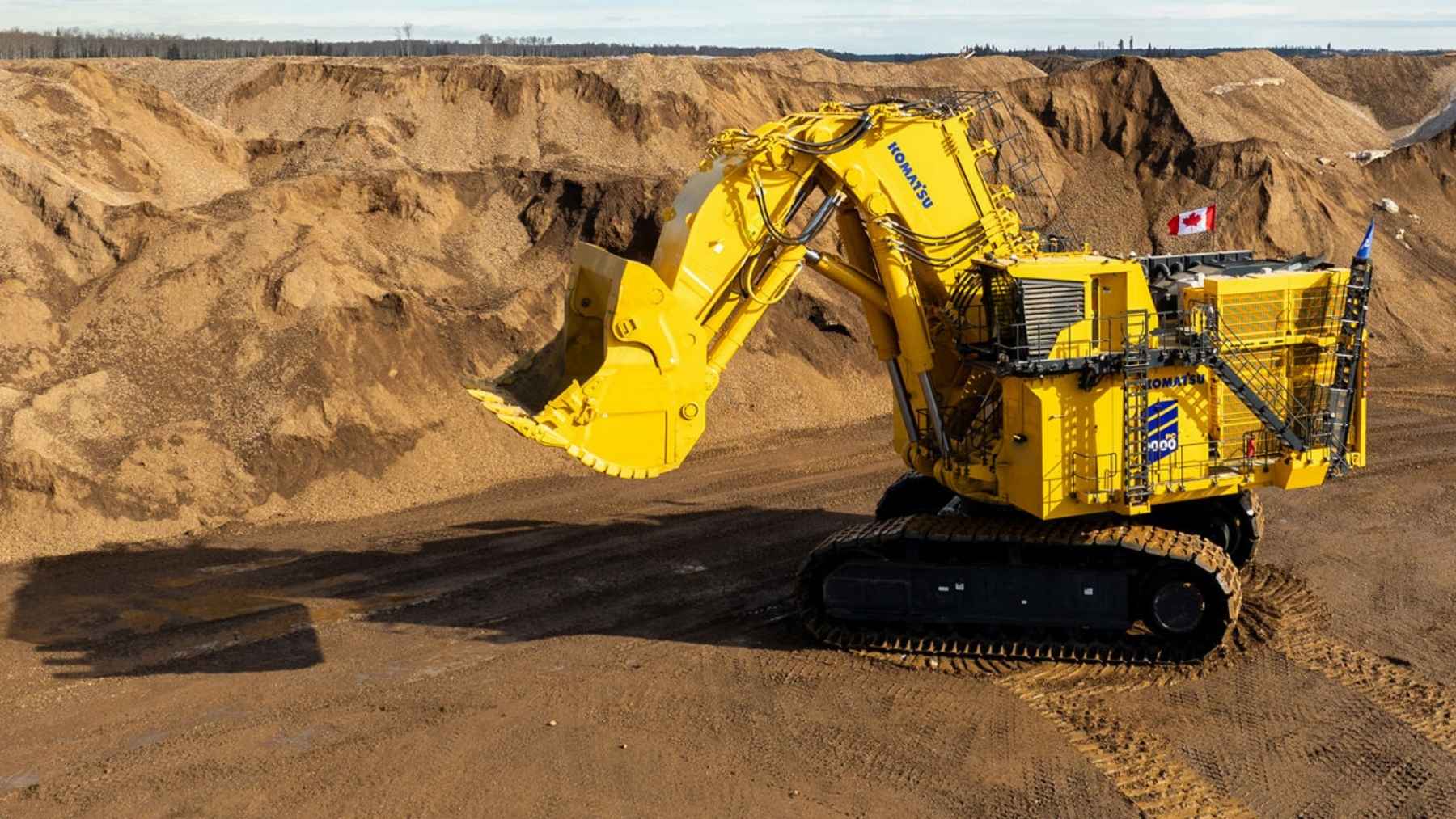 A 896-ton German excavator that grabs 80 tons of rock a scoop crossed the Atlantic in 31 pieces to reach a Canadian mine, and its maker will now sell the electric version worldwide — a building-sized machine plugged into the grid like an enormous slot car