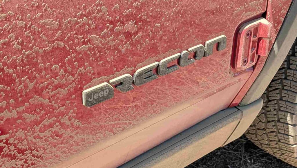 The Recon logo on a dusty background