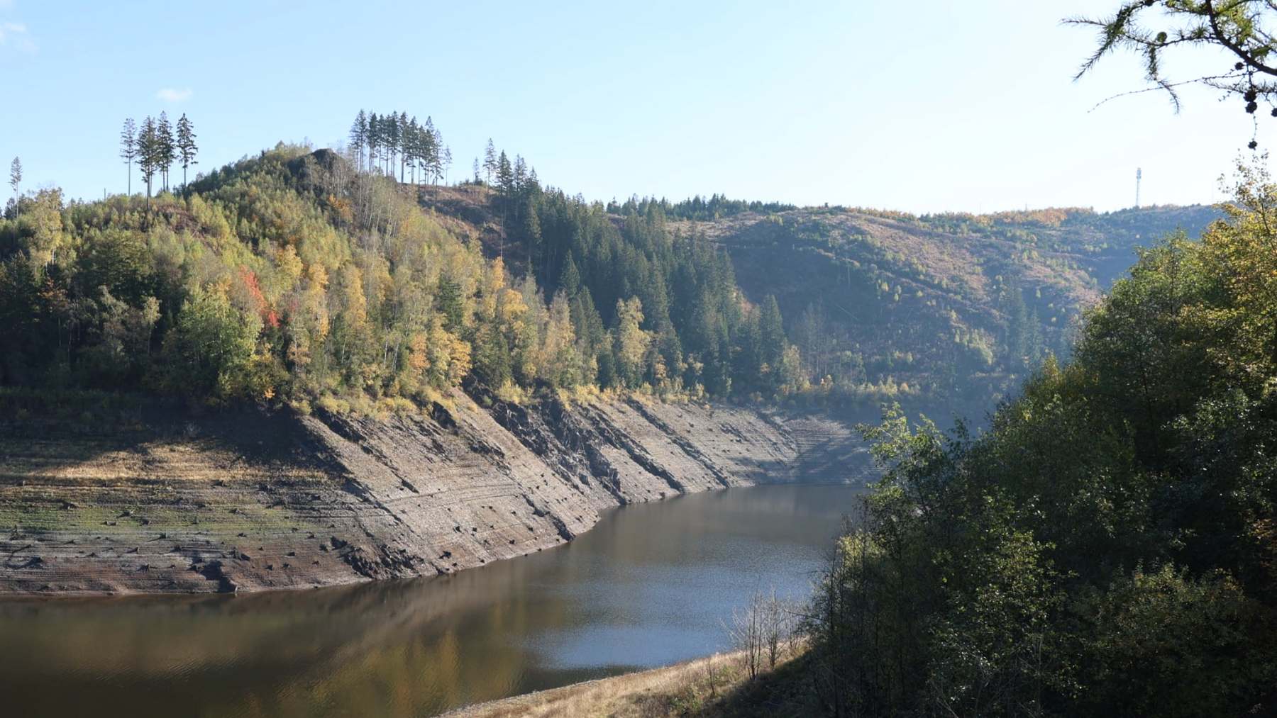 A 246-foot arch dam in Germany’s Harz mountains is down to 16 percent, the lowest since it was built, the walls of the village it drowned in the 1950s are back above the mud, and its operator has permission to cut the river below to 35 cubic feet a second