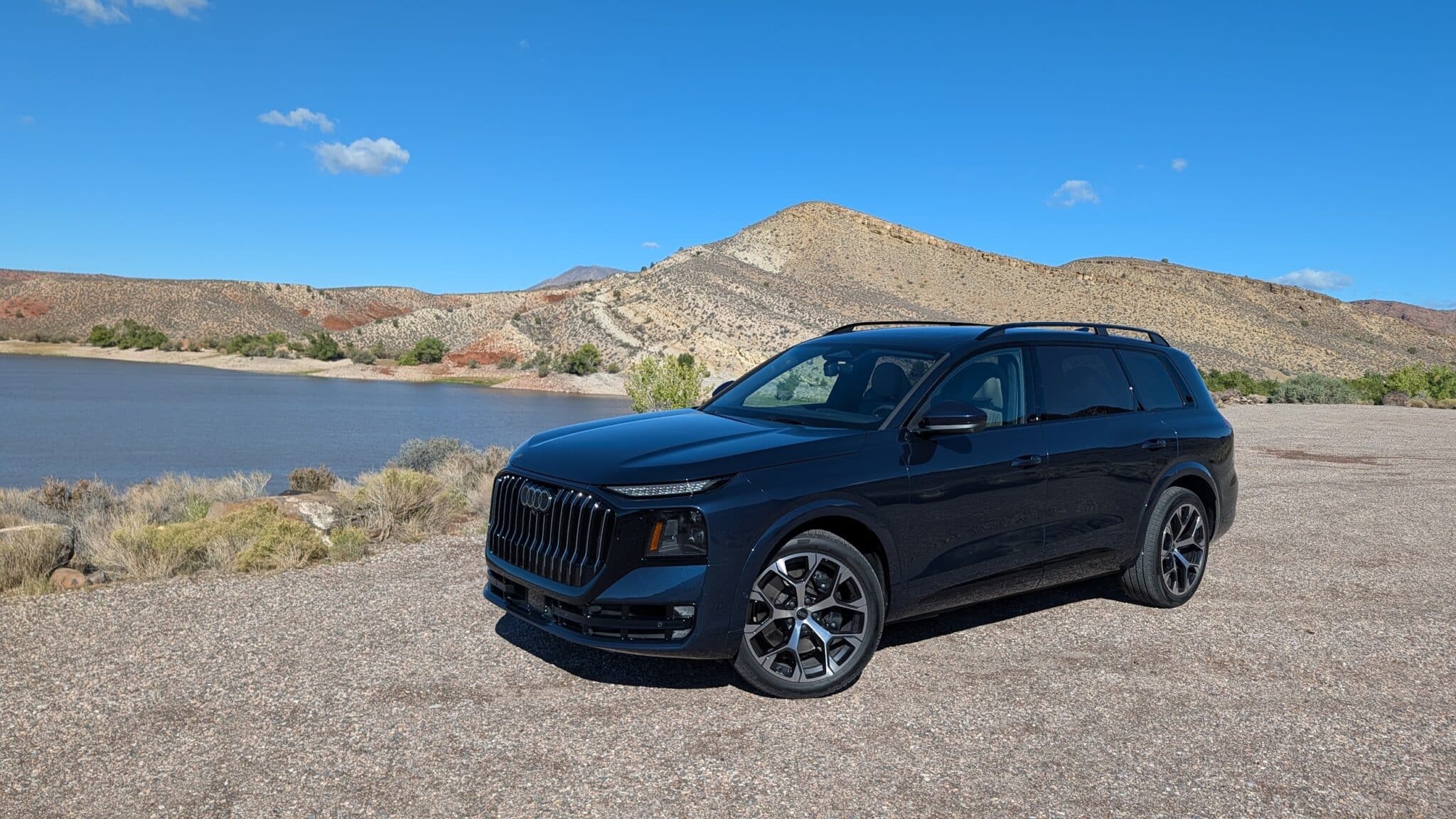 The 2027 Audi Q9 Front view near a reservoir