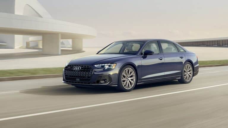 2026 Audi A8 in dark blue, front three-quarter view
