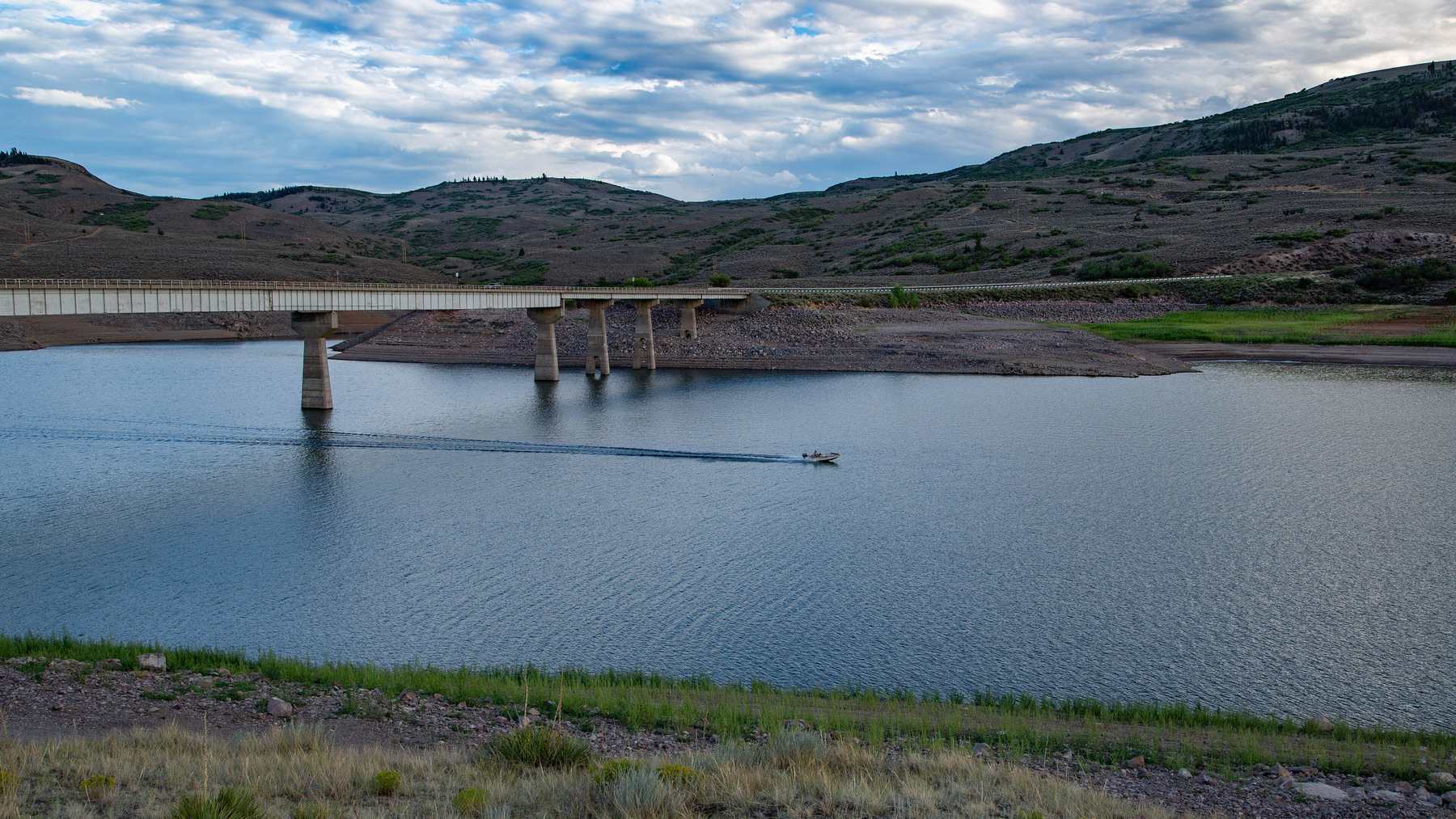 A 390-foot earthen dam in Colorado has drawn its lake down to 17 percent, 19 feet above the line where its two turbines stop making power, after the driest snowmelt on record, and the river below has been cut to about 210 cubic feet a second to keep them turning