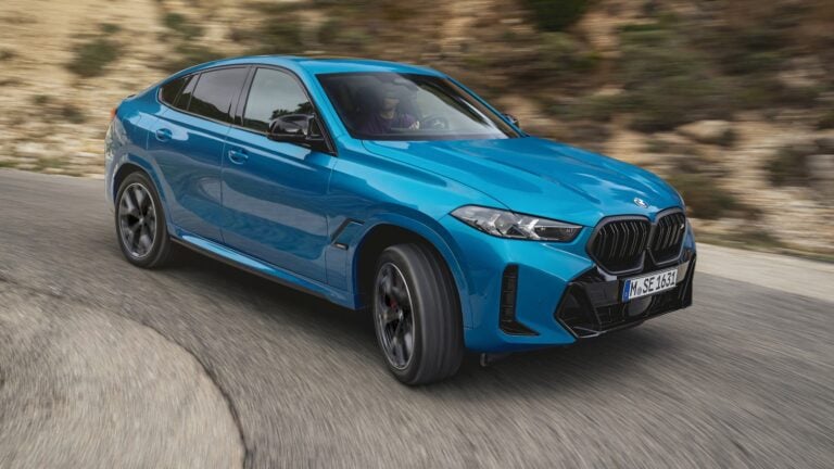 2026 BMW X6 M60i in blue, front three-quarter view