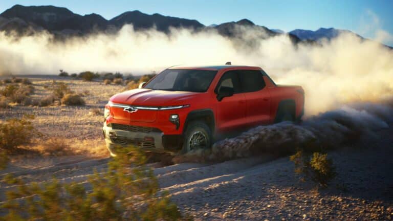 2026 Chevrolet Silverado EV, Trail Boss front three-quarter view in red
