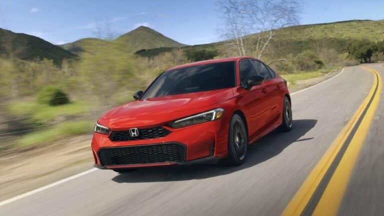 2027 Honda Civic Hybrid, front three-quarter view in red