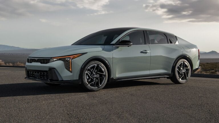 2027 Kia K4 in gray, front three-quarter view