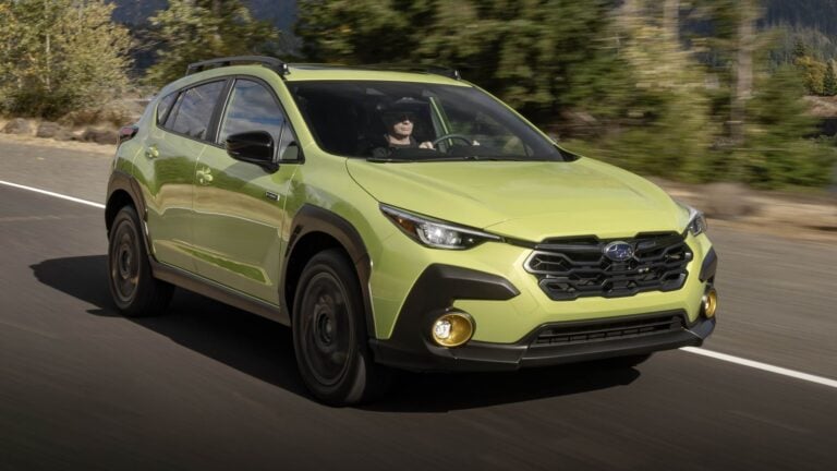 2026 Subaru Crosstrek Hybrid in green, front three-quarter view