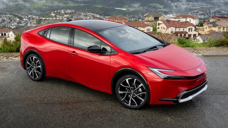 2027 Toyota Prius Plug-in Hybrid (Prius Prime) XSE in Supersonic Red, front three-quarter view