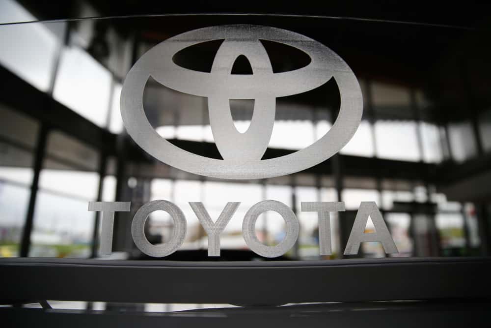 A Toyota logo is seen in a showroom at a Toyota dealership in Warsaw in this April 11, 2014, file photo. Toyota Motor Corp. is moving its U.S. sales headquarters from southern California to suburban Dallas, according to two people familiar with the company's plans, April 28, 2014. REUTERS/Kacper Pempel/Files (POLAND - Tags: TRANSPORT BUSINESS LOGO)