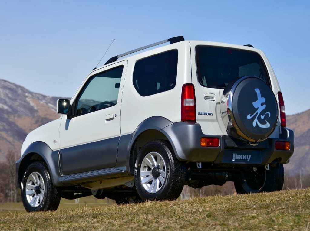 Купить судзуки владивостоке. Suzuki Jimny 2013. Судзуки Джимни 2015. Suzuki Jimny 13. Сузуки Джимни 2013.